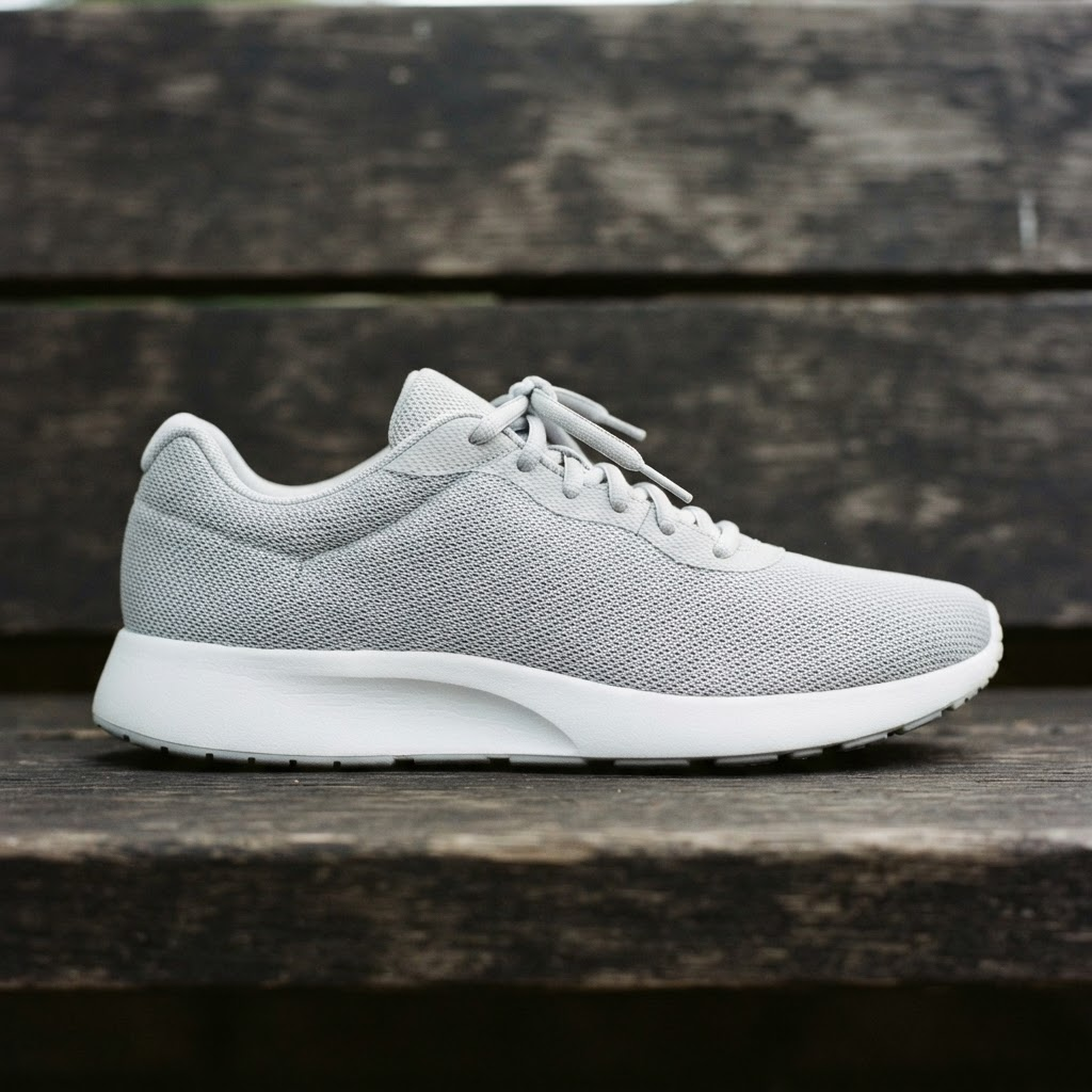 After: Grey mesh running trainer before and after a deep clean